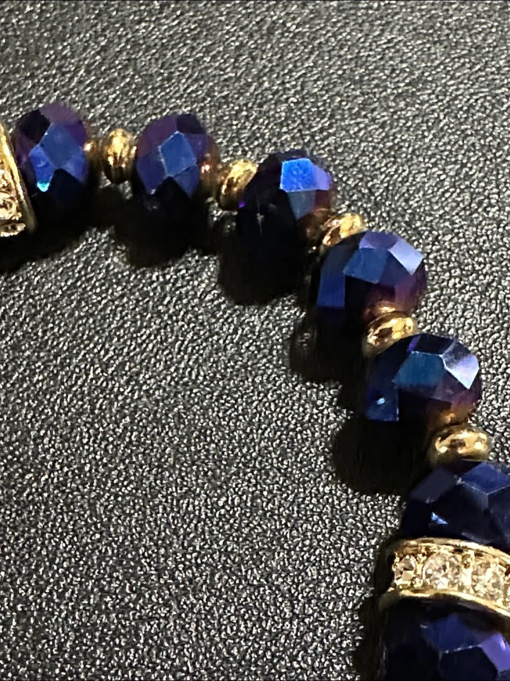 Guess Royal Blue Faceted Crystal Gold Tone Accent Stretch Bracelet